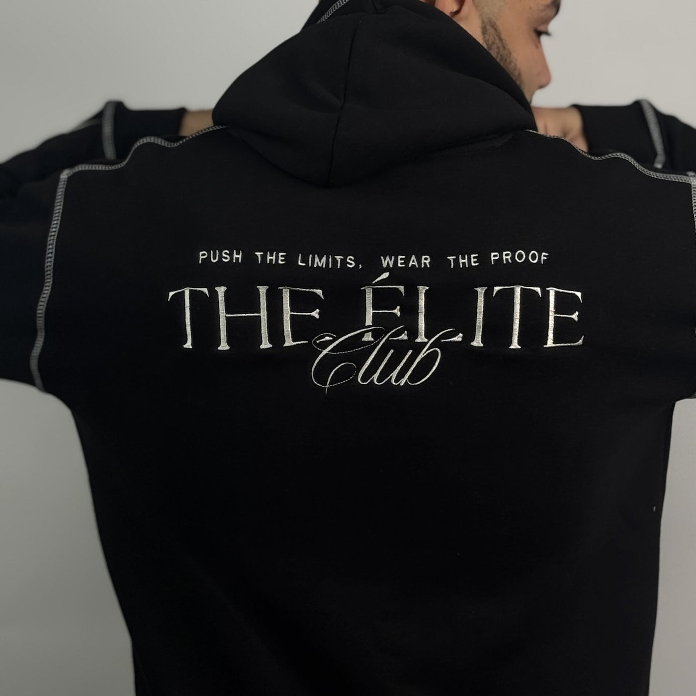 Elite Club Hoodie in Black — back embroidery detail