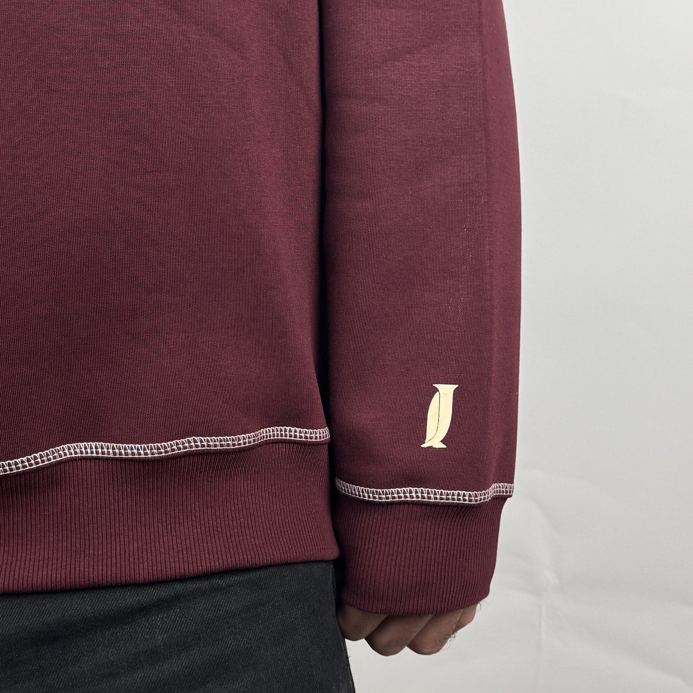 Elite Club Hoodie in Burgundy — cuff detail