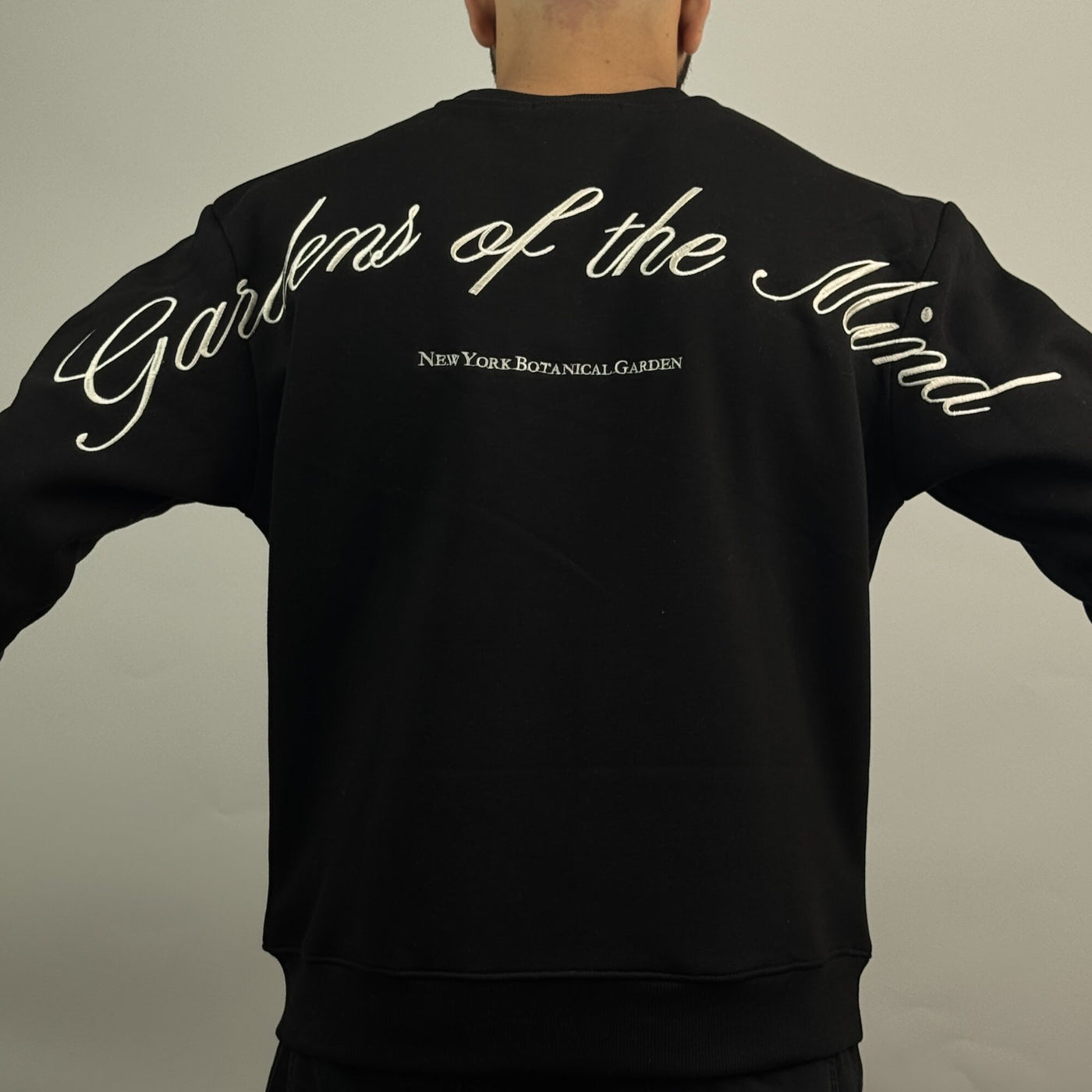 Garden of the Mind Crew in Black — embroidery detail
