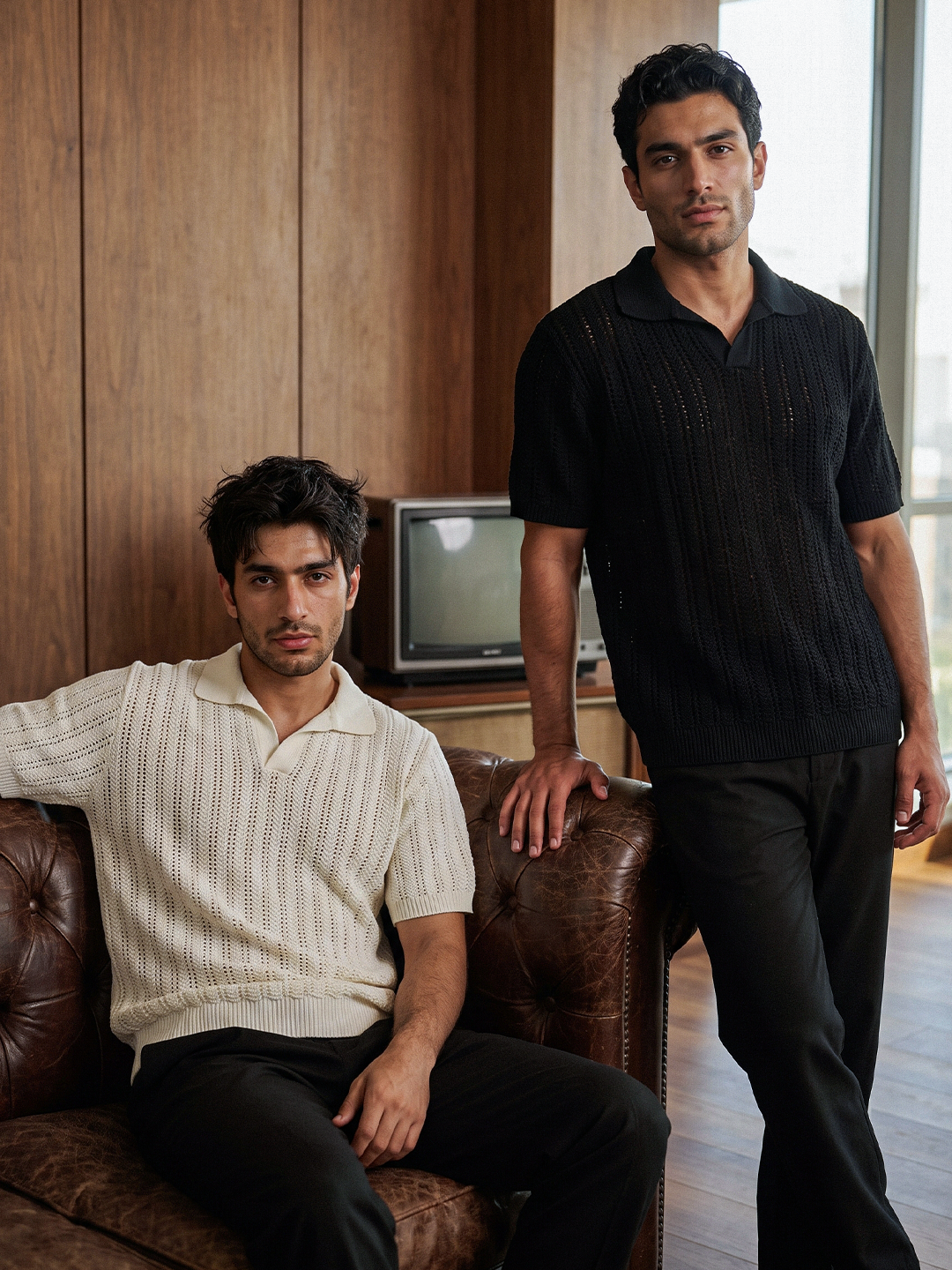 Knitted polo black and cream lifestyle image