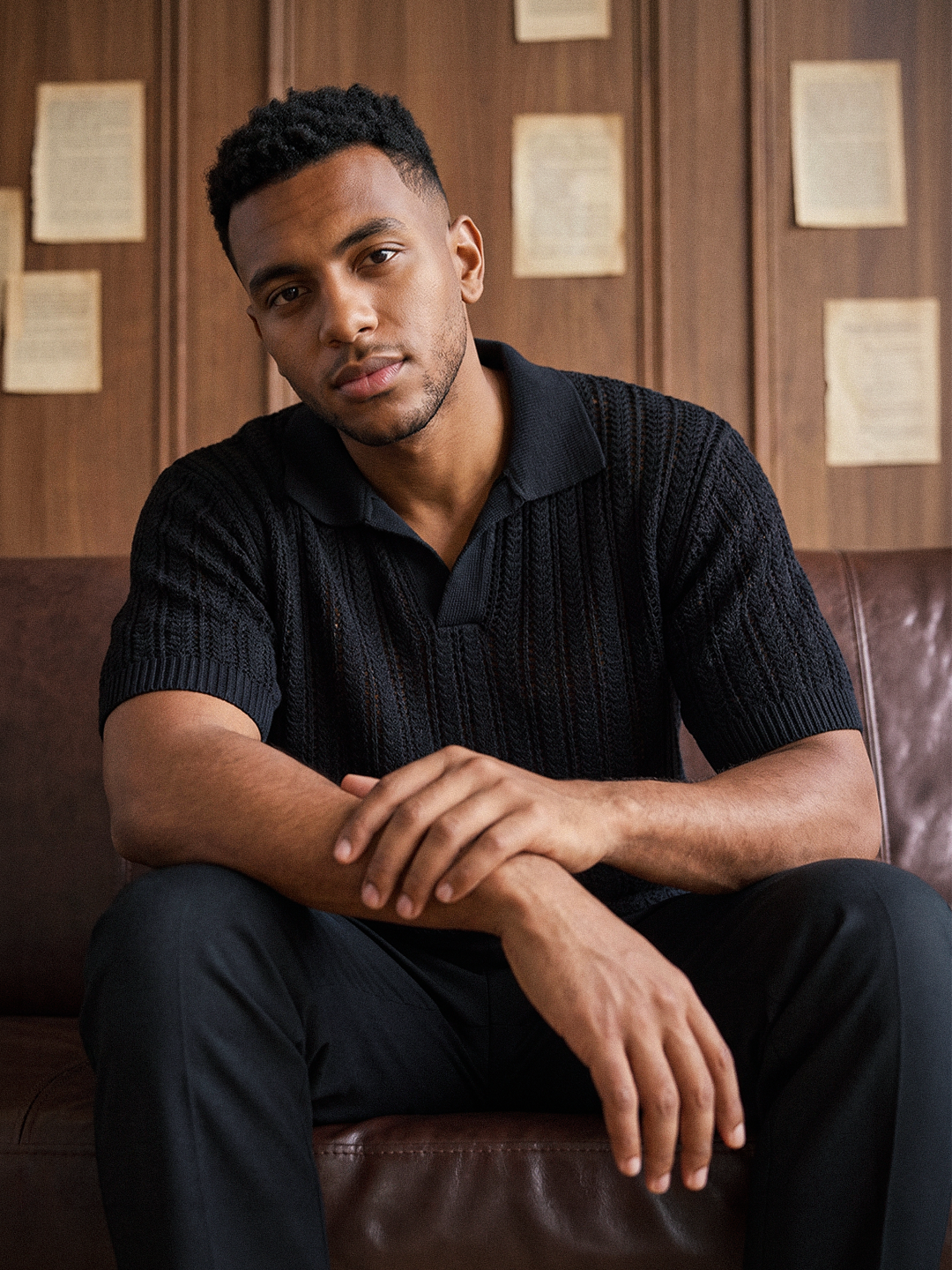 Knitted polo black lifestyle image
